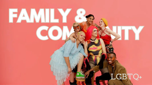 Six lgbtq+ people posing for a family and community portrait