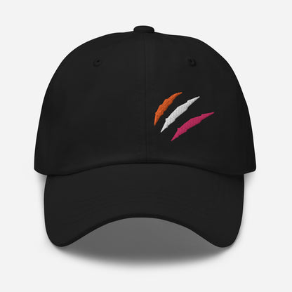 Black baseball hat featuring lesbian pride scratch mark embroidery with a low profile, adjustable strap.