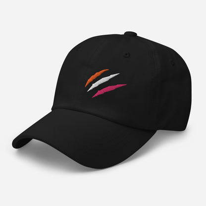 Black baseball hat featuring lesbian pride scratch mark embroidery with a low profile, adjustable strap.