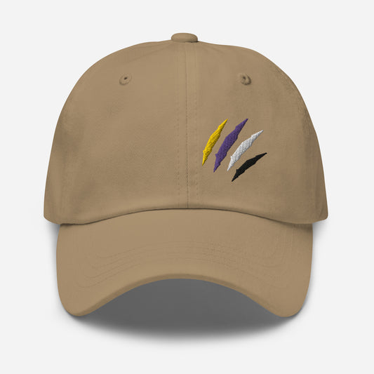 Khaki baseball hat featuring non-binary pride scratch mark embroidery with a low profile, adjustable strap.