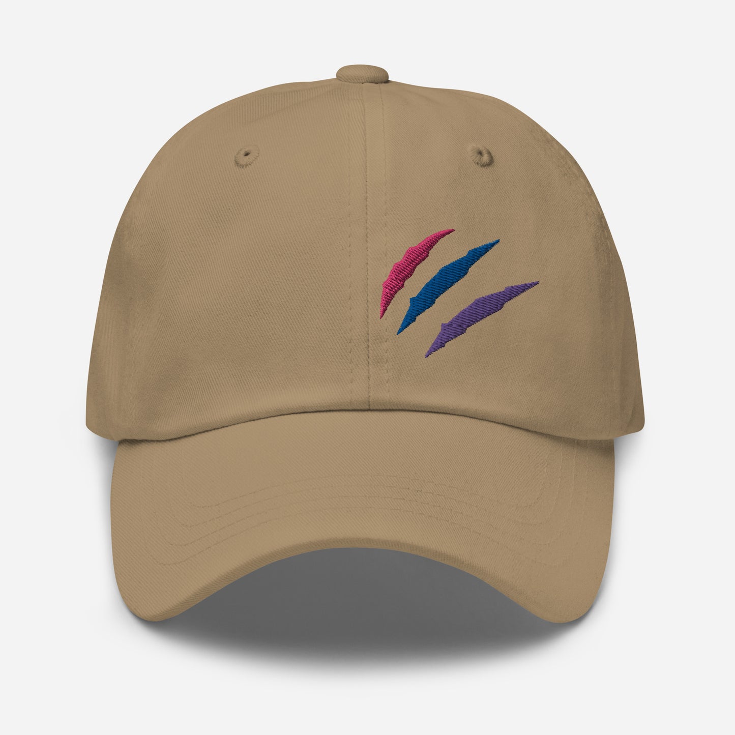 Baseball hat featuring bisexual pride scratch mark embroidery in khaki with a low profile, adjustable strap.