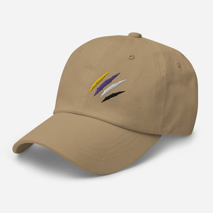 Khaki baseball hat featuring non-binary pride scratch mark embroidery with a low profile, adjustable strap.