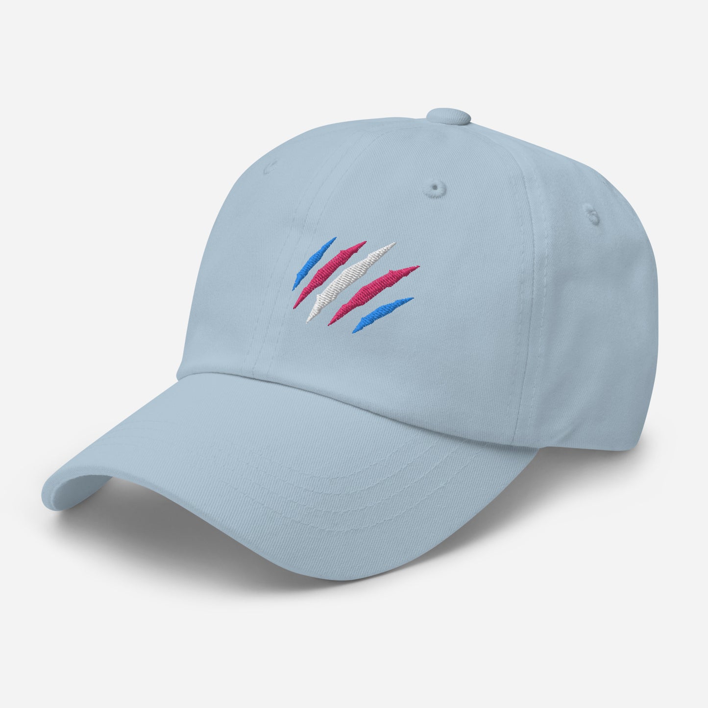 Light blue baseball hat featuring transgender pride scratch mark embroidery with a low profile, adjustable strap.