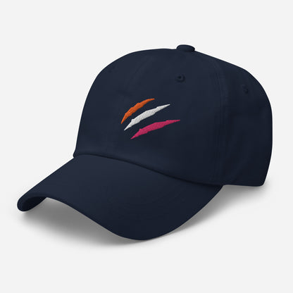 Navy baseball hat featuring lesbian pride scratch mark embroidery with a low profile, adjustable strap.