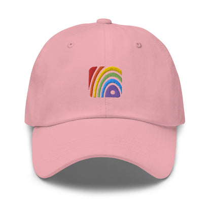 Pink baseball hat featuring rainbow design embroidery with a low profile, adjustable strap.