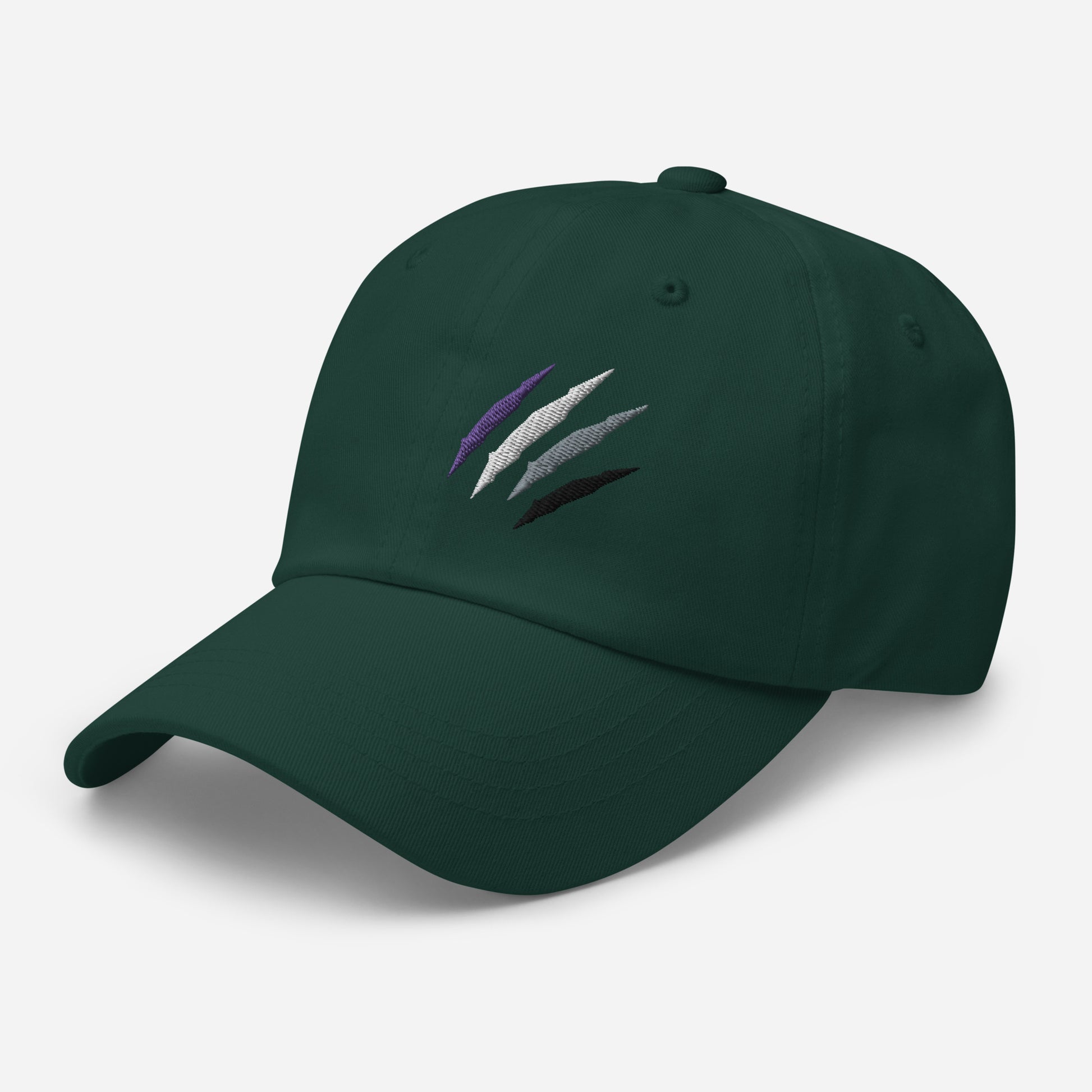 Baseball hat featuring asexual pride scratch mark embroidery in spruce with a low profile, adjustable strap.