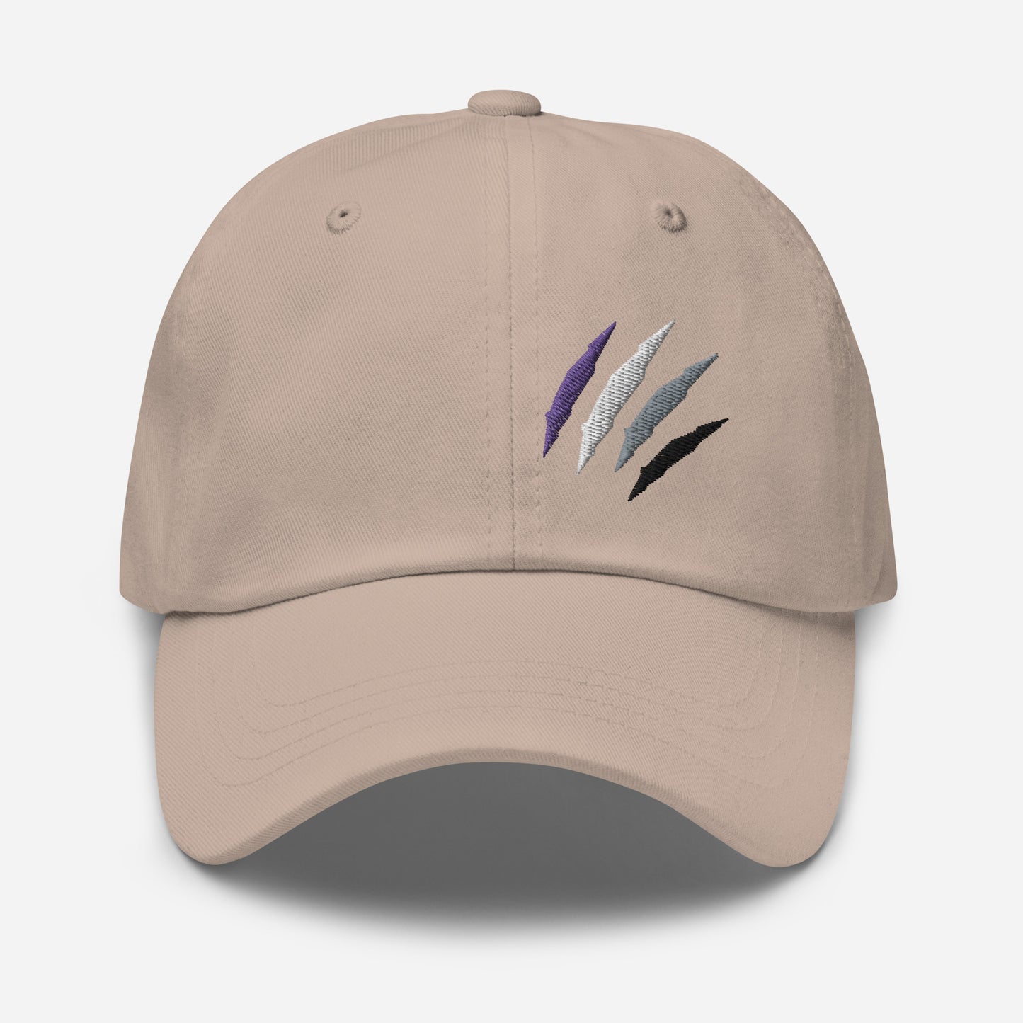 Baseball hat featuring asexual pride scratch mark embroidery in stone with a low profile, adjustable strap.