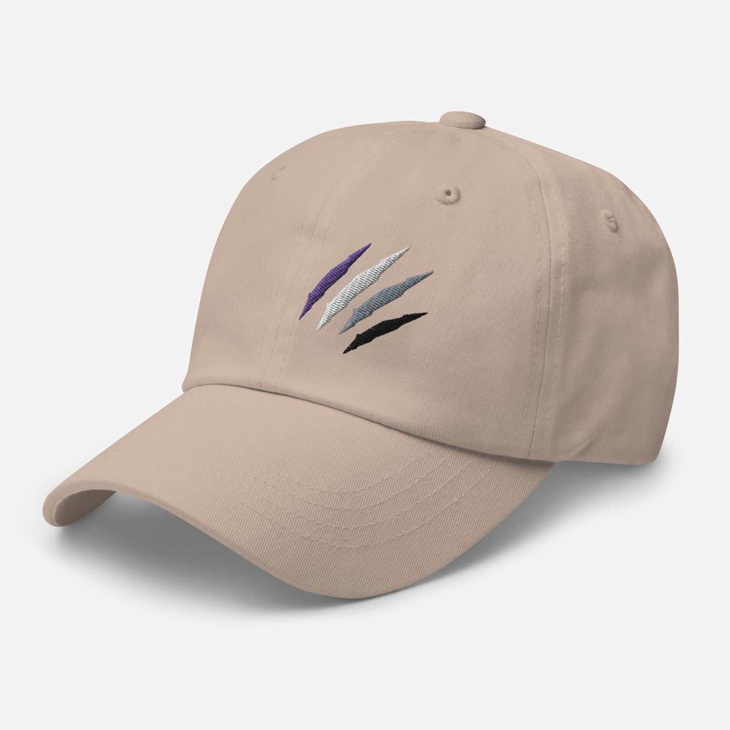 Baseball hat featuring asexual pride scratch mark embroidery in stone with a low profile, adjustable strap.