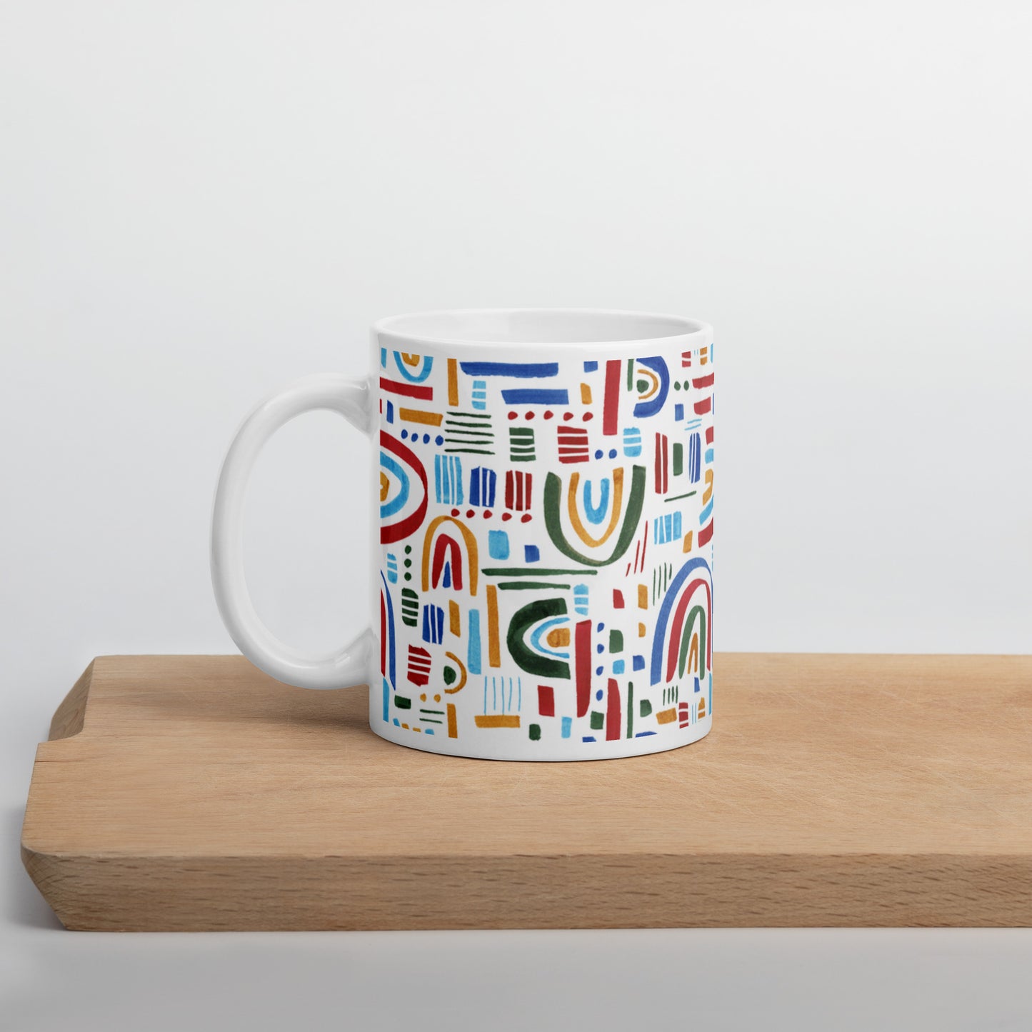 White Glossy Mug: Wile Rainbow Patters