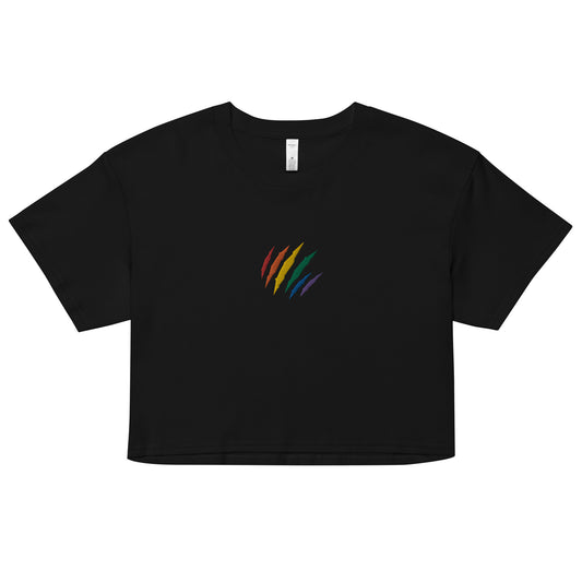 A relaxed, modest black crop top features a subtle rainbow mark embroidery. Adding a touch of rainbow to your look—a playful celebration of lgbtq culture! Made from 100% combed cotton. Available in Extra Small, Small, Medium, Large, Extra Large.