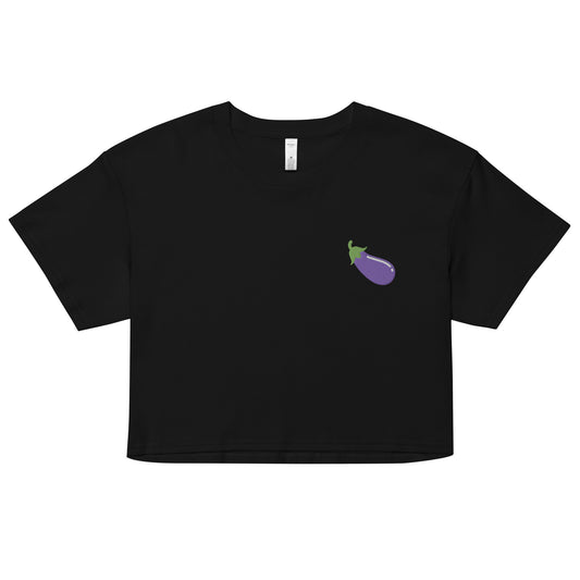 A relaxed black crop top features a modest crop and subtle eggplant embroidered design, adding a touch of mischief to your look—a playful celebration of gay culture! Made from 100% combed cotton. Available in Extra Small, Small, Medium, Large, Extra Large.