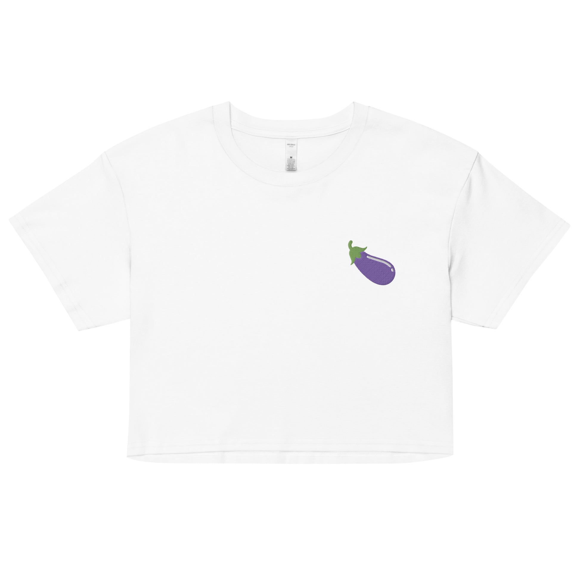 A relaxed white crop top features a modest crop and subtle eggplant embroidered design, adding a touch of mischief to your look—a playful celebration of gay culture! Made from 100% combed cotton. Available in Extra Small, Small, Medium, Large, Extra Large.