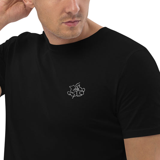 Male model wearing a fitted black organic cotton t-shirt with a small embroidered line art of two men kissing on the left chest, and an embroidered pride rainbow flag on the right sleeve. Available in sizes S to 3XL.